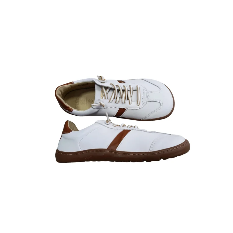 Vista lateral de las zapatillas barefoot piel mujer con suela Zero Drop